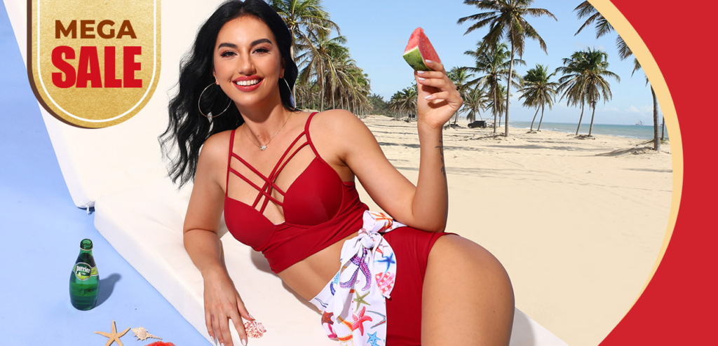 Woman in swimsuit holding slice of watermelon
